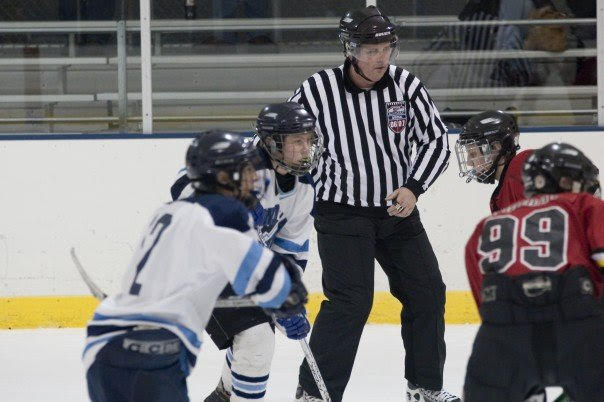 Steve's kids playing hockey